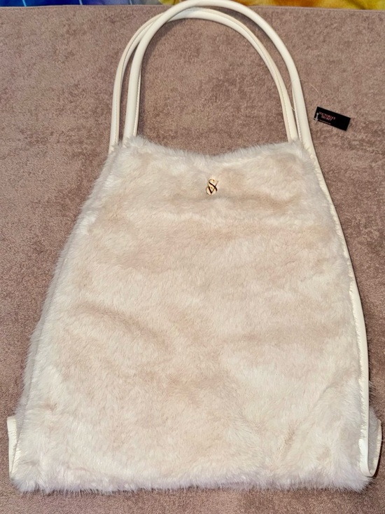 Victoria's Secret Handbags - Victoria's Secret Cream Faux Fur Tote with Gold VS Charm